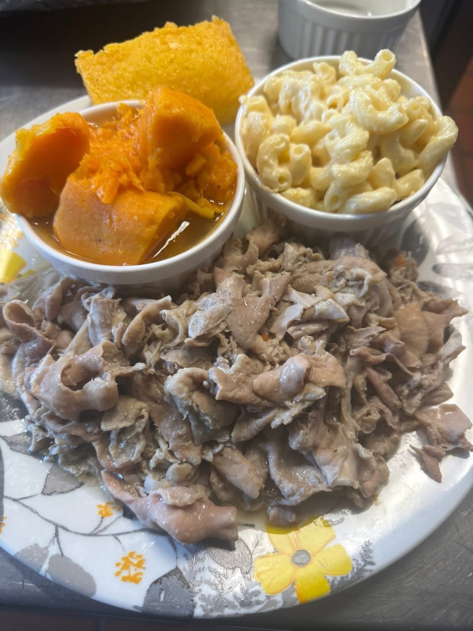 Fried chicken wings platter with mac and cheese and candied yams